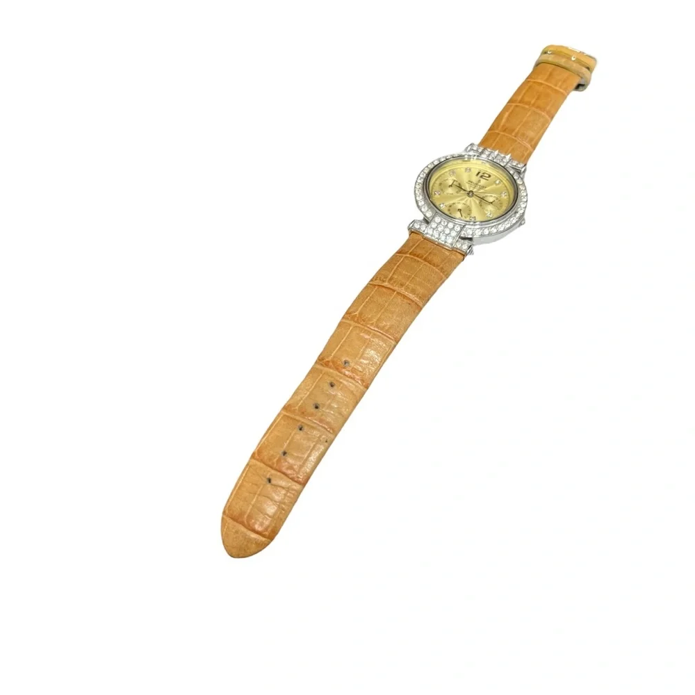 P. PEUGEOT YELLOW FACE & CROCODILE STAMPED BAND WITH CRYSTAL BEZEL WATCH